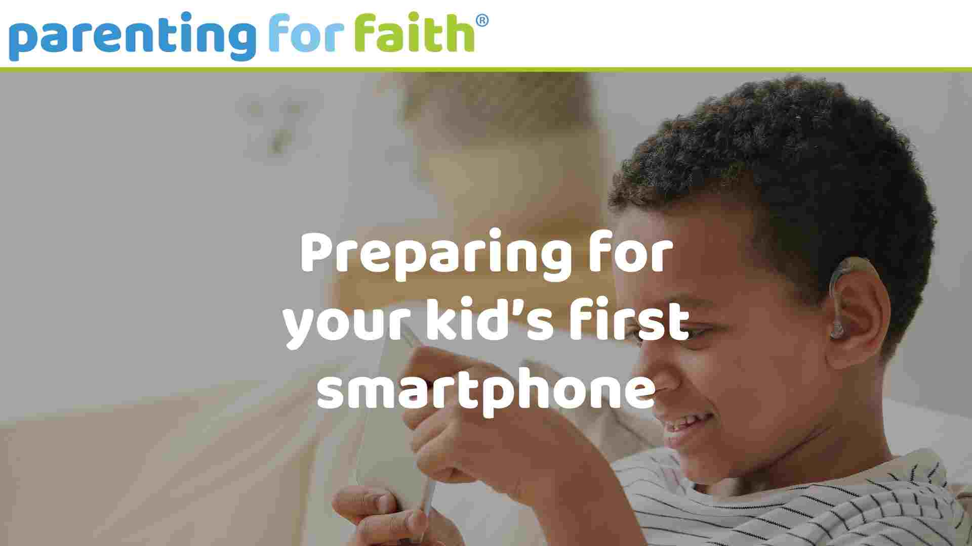 Little Boy with Hearing Aid Using Mobile Phone at Home image credit pixelshot via Canva Pro ()